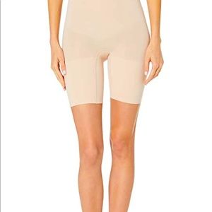 Spanx high waist control shape wear.